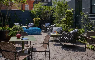 The courtyard at Beaverbrook Town House, planting and garden seating off Sloane Street