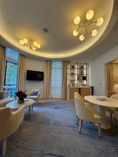 A suite living area at One Aldwych, showing the rounded ceiling that follows the building's corner